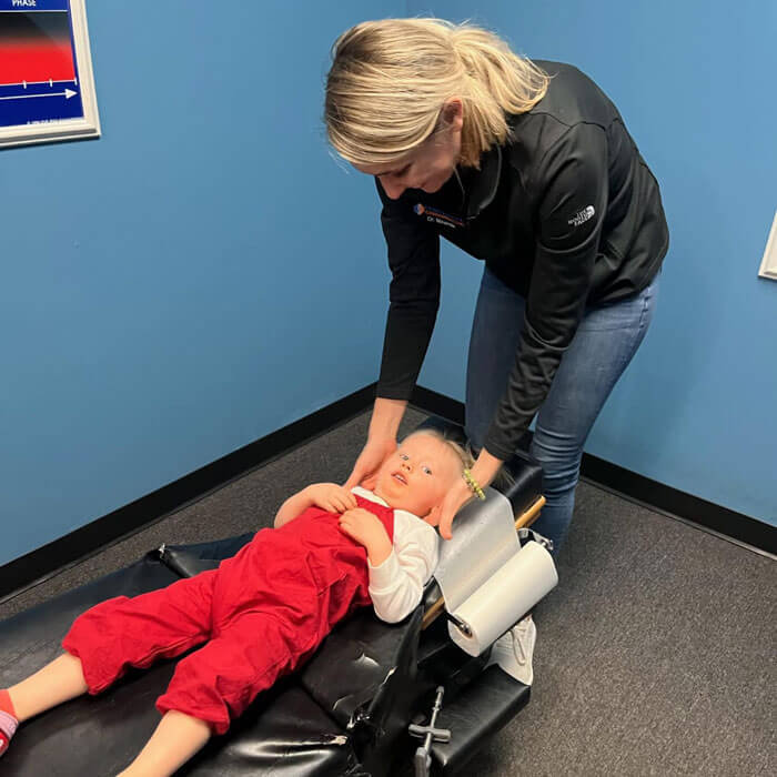 chiropractor sees children for wellness chiropractic care